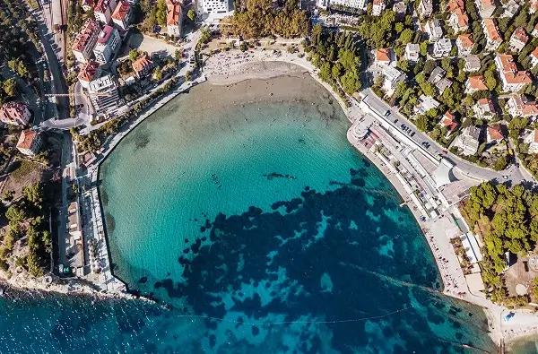 An aerial photo of Bacvice beach that shows the area where to stay in Split Croatia.