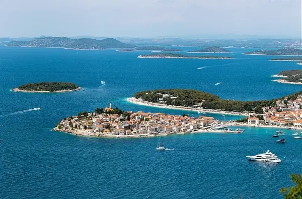 An aerial overview of a Croatian city and surrounding sea
